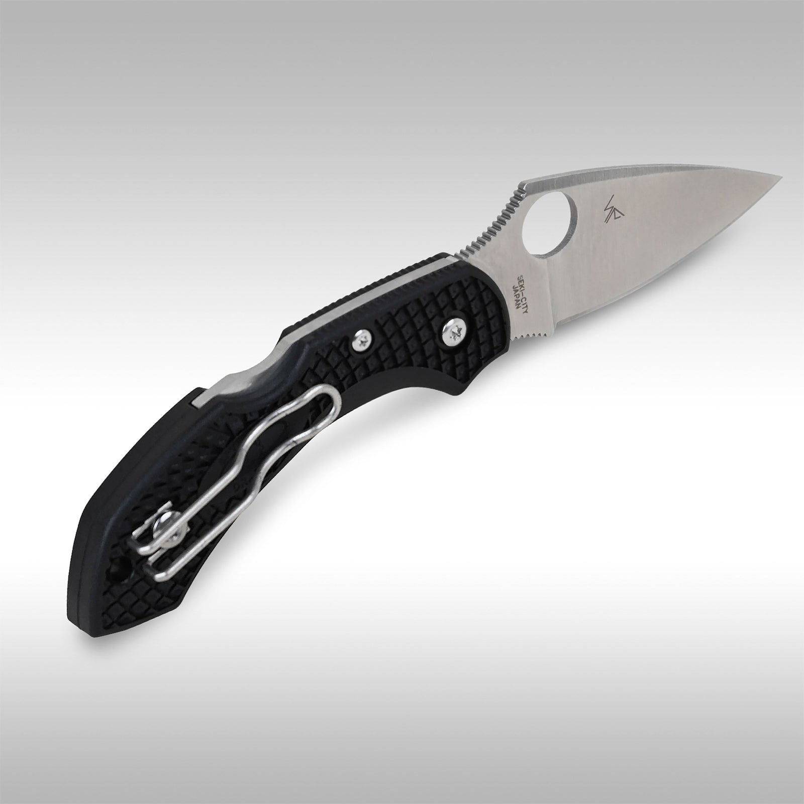 A SPYDERCO DRAGONFLY 2 knife with a black Kraton handle and a stainless steel blade visible from the side. The knife is partially open, displaying the blade and the handle.