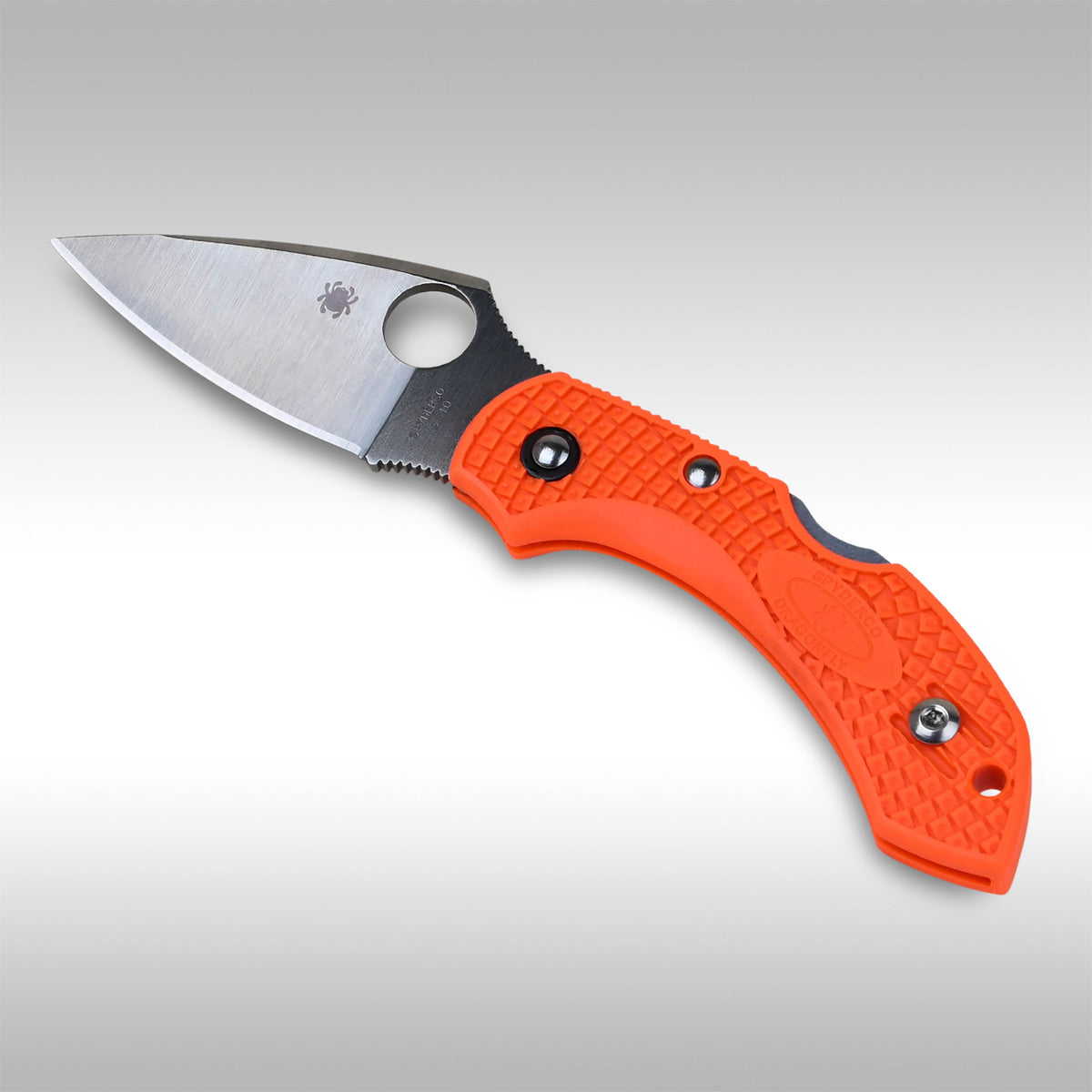A SPYDERCO DRAGONFLY 2 knife with an orange handle and a stainless steel blade visible from the side.