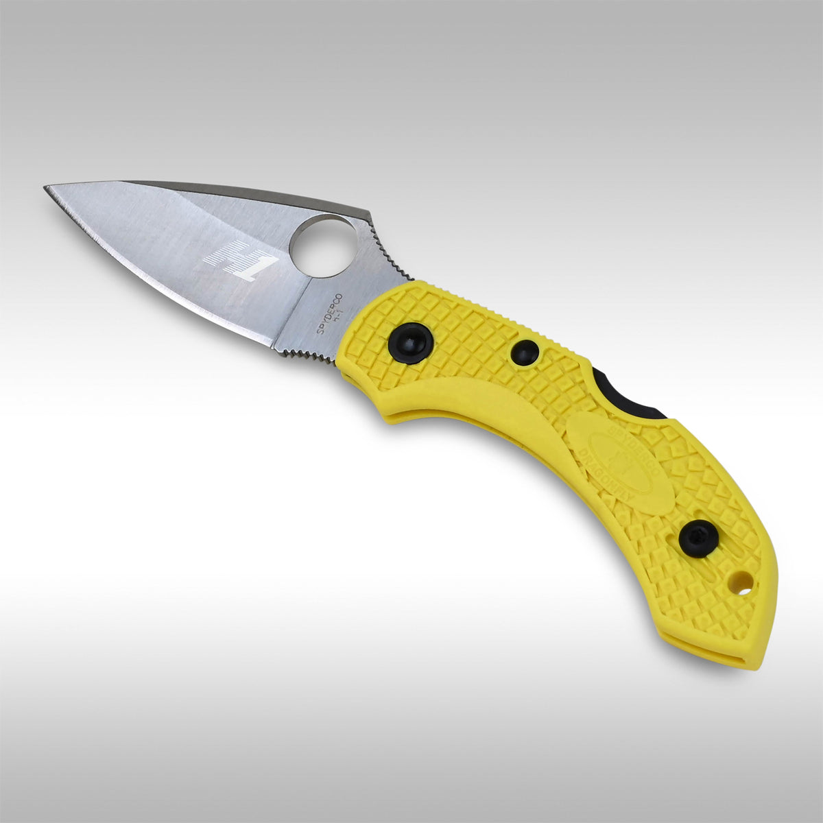 A SPYDERCO DRAGONFLY 2 knife with a yellow handle and a stainless steel blade visible from the side.