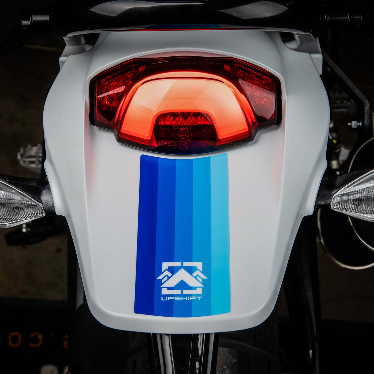 Ducati motorcycle with Blue Gradient styling kit on a gray background