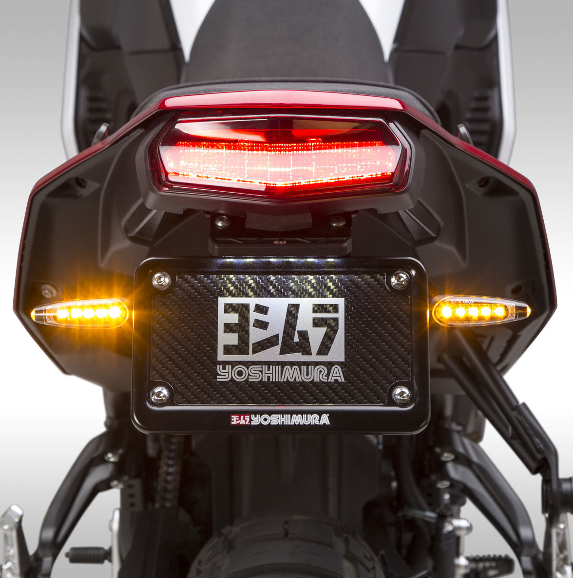 Clean up the rear fender of your Tenere 700 with the Yoshimura rear fender eliminator kit. Tenere 700 tail tidy kit. Kit incorporates Shrink Solder Connectors and a new and improved weather tight light housing, and brighter DOT compliant LED light. Made in the USA!